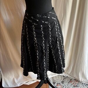 Reitmans Black Floral Women's skirt with white embroidered flowers and pleats